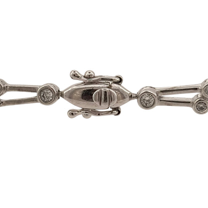 Add timeless diamond detail to your jewellery collection with this pre-owned 18ct white gold double-row diamond bracelet, featuring approximately 0.76ct of total diamond content in an elegant and eye-catching design.
Design: The bracelet features a double-row design with diamonds arranged across two lines, creating a refined and luxurious appearance that beautifully showcases the stones.