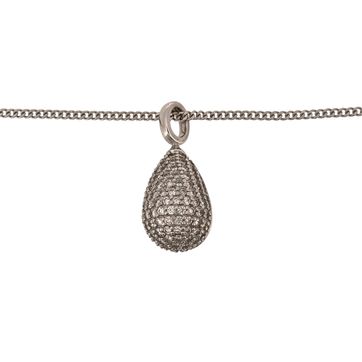 Add bold diamond detail to your jewellery collection with this pre-owned 18ct white gold diamond teardrop pendant necklace, featuring a chunky three-dimensional design presented on a classic 18-inch curb chain.
Design: The pendant features a substantial 3D teardrop shape, creating a sculptural and eye-catching profile enhanced by diamond detailing.
Material: Made from 18-carat white gold, the bright finish complements the diamonds and highlights the pendant’s distinctive three-dimensional shape.