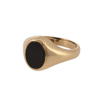 Add a timeless statement piece to your jewellery collection with this pre-owned 9ct yellow gold and onyx oval signet ring, featuring a bold black onyx stone in a classic signet-style design.

Design: The ring features a traditional oval signet shape with a prominent onyx stone at the centre, creating a clean and distinctive look suitable for everyday wear.
Material: Made from 9-carat yellow gold, the warm gold tone creates a striking contrast against the deep black onyx for a classic finish.