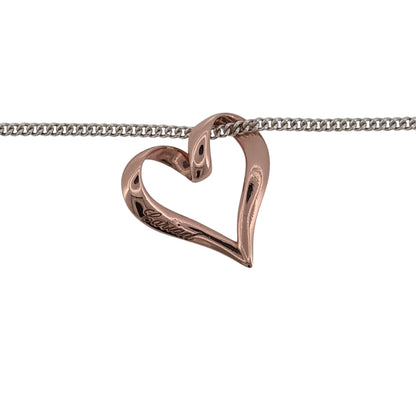 Add a romantic Welsh-inspired piece to your jewellery collection with this pre-owned Clogau Cariad Open Heart pendant necklace, combining 925 sterling silver with 9ct rose gold detailing.

Design: The pendant features an elegant open heart design from Clogau’s Cariad collection, creating a simple yet distinctive symbol of love.
Material: Made from 925 sterling silver with 9-carat rose gold Clogau detailing, the contrasting metals create a classic two-tone finish that highlights the heart design.