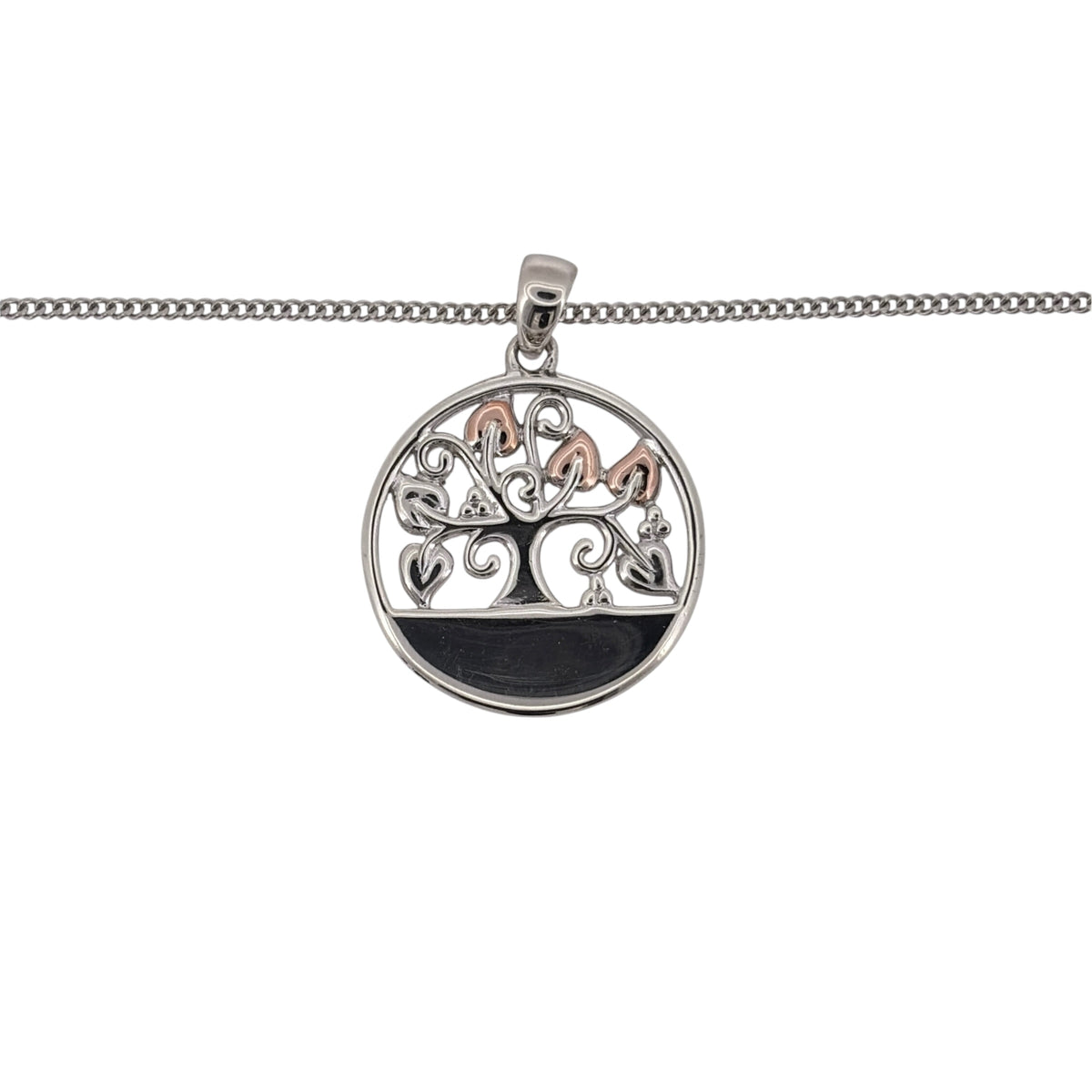 Add a classic Welsh-inspired piece to your jewellery collection with this pre-owned Clogau Round Tree of Life pendant necklace, combining 925 sterling silver with 9ct rose gold detailing.

Design: The pendant features Clogau’s recognisable Tree of Life motif within a round design, with flowing branches creating an elegant and distinctive focal point.
