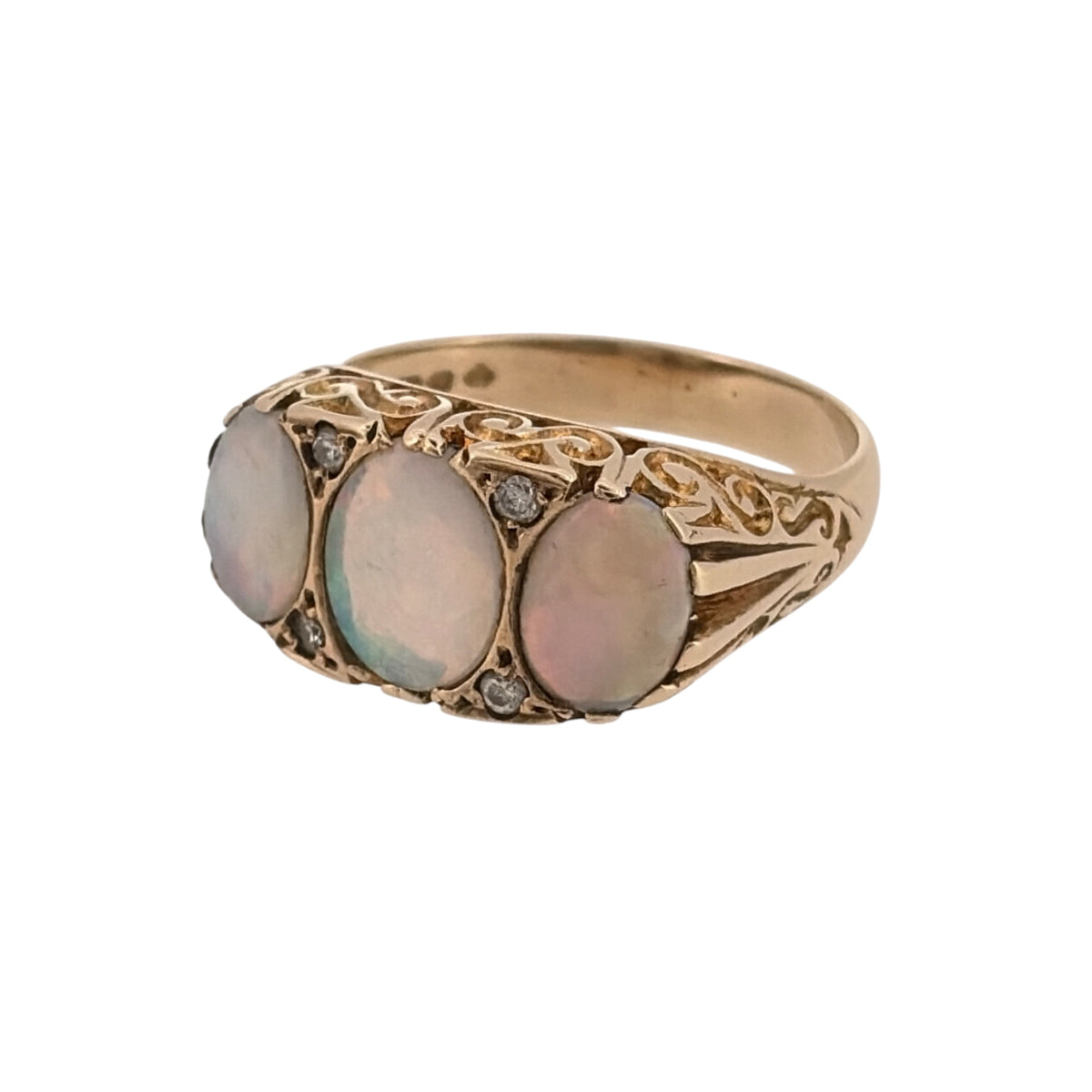 Add vintage-inspired colour to your jewellery collection with this pre-owned 9ct yellow gold diamond and Opalique trilogy ring, featuring three graduated Opalique stones with diamond detailing.

Design: The ring features a vintage-style trilogy design, with a larger central Opalique stone flanked by two slightly smaller Opalique stones for a balanced and eye-catching appearance.
Material: Made from 9-carat yellow gold, the warm gold tone complements the colourful appearance of the Opalique stones.