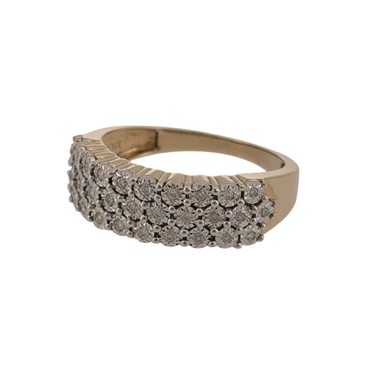 Add classic diamond detail to your jewellery collection with this pre-owned 9ct yellow gold three-row diamond band ring, featuring approximately 0.16ct of diamonds in total.

Design: The ring features a three-row design across the front of the band, creating a layered diamond-set appearance with a bold yet wearable profile.
Material: Made from 9-carat yellow gold, the warm gold tone provides a classic setting for the diamond detailing.