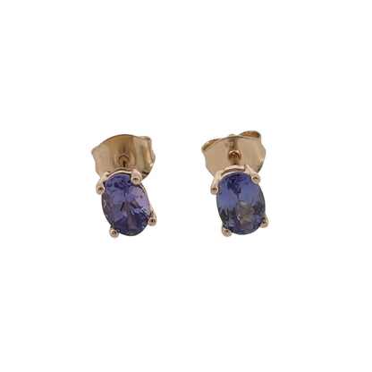 Add a touch of colour to your jewellery collection with these pre-owned 9ct yellow gold tanzanite stud earrings, featuring elegant oval tanzanite stones.

Design: The earrings feature a classic oval stud design, allowing the tanzanite stones to form the main focal point for a simple and elegant appearance.
Material: Made from 9-carat yellow gold, the warm gold tone complements the distinctive blue-violet colour of the tanzanite stones.