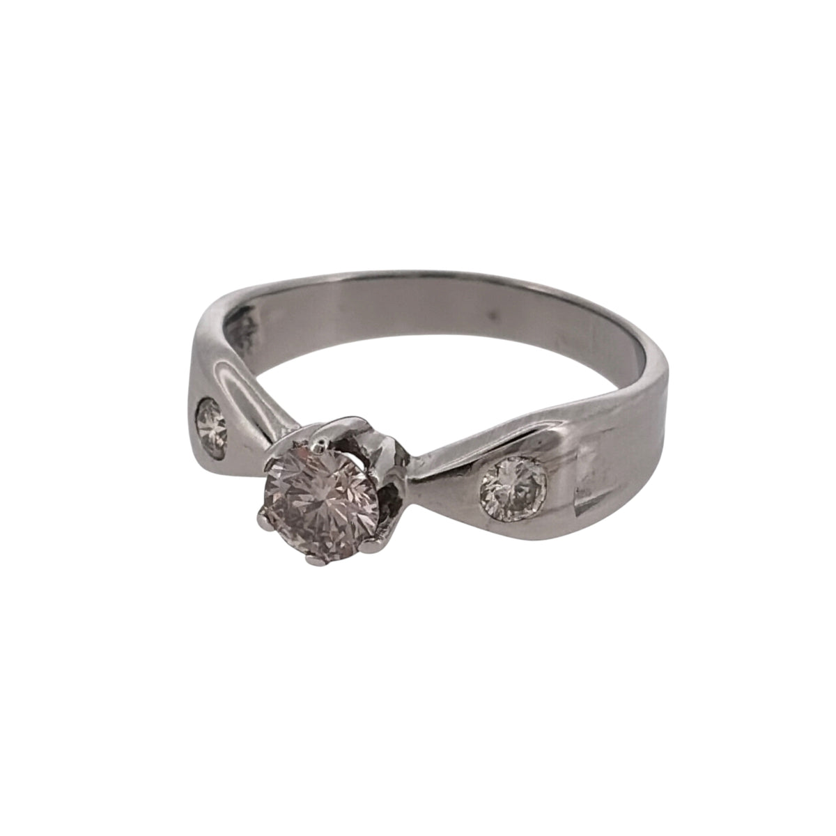 Add classic diamond elegance to your jewellery collection with this pre-owned 14ct white gold solitaire ring, featuring a central brilliant-cut diamond complemented by a brilliant-cut diamond on each shoulder.

Design: The ring features a classic solitaire-style design, with a central diamond forming the main focal point and additional diamonds set into the shoulders for extra detail.