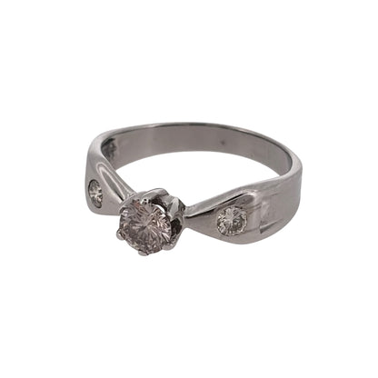Add classic diamond elegance to your jewellery collection with this pre-owned 14ct white gold solitaire ring, featuring a central brilliant-cut diamond complemented by a brilliant-cut diamond on each shoulder.

Design: The ring features a classic solitaire-style design, with a central diamond forming the main focal point and additional diamonds set into the shoulders for extra detail.