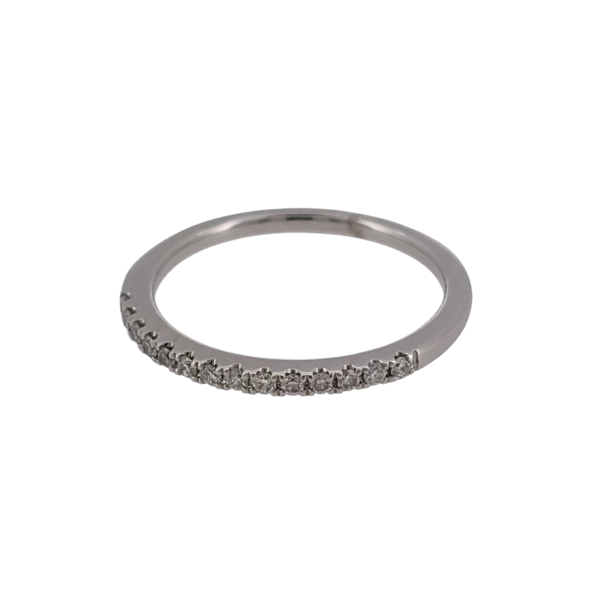 Add subtle diamond detail to your jewellery collection with this pre-owned 18ct white gold diamond band ring, featuring approximately 0.13ct of diamonds in a slim and elegant design.

Design: The ring features a delicate diamond-set band design, creating a refined and versatile appearance that can be worn alone or alongside other rings.
Material: Made from 18-carat white gold, the bright white finish complements the diamonds and gives the ring a classic appearance.