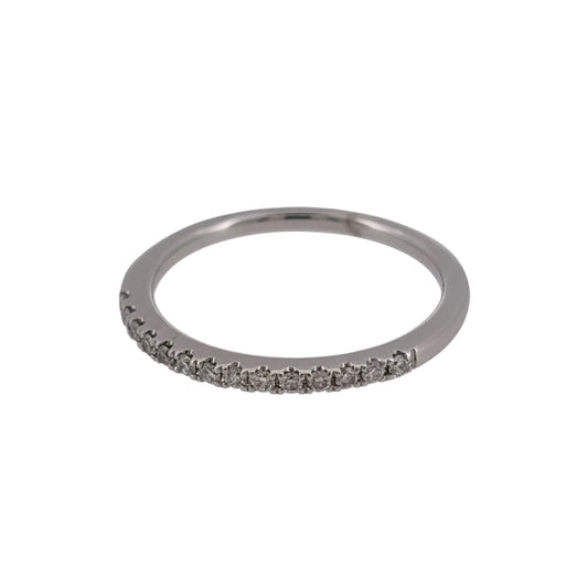 Add subtle diamond detail to your jewellery collection with this pre-owned 18ct white gold diamond band ring, featuring approximately 0.13ct of diamonds in a slim and elegant design.

Design: The ring features a delicate diamond-set band design, creating a refined and versatile appearance that can be worn alone or alongside other rings.
Material: Made from 18-carat white gold, the bright white finish complements the diamonds and gives the ring a classic appearance.