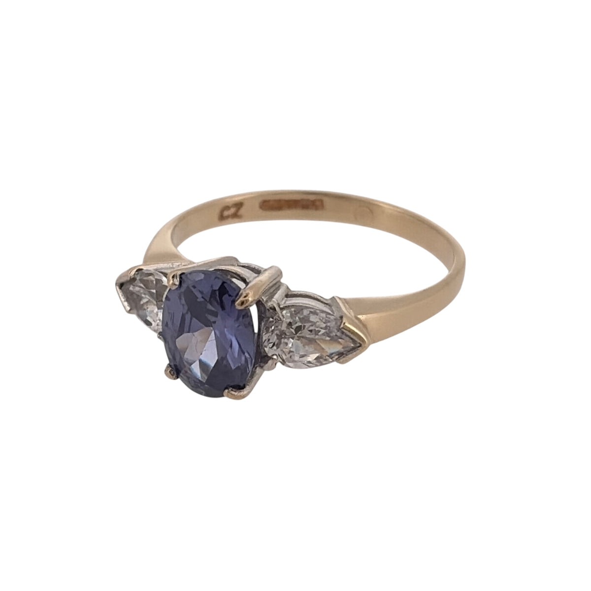 Add elegant gemstone colour to your jewellery collection with this pre-owned 9ct yellow gold tanzanite and cubic zirconia ring, featuring a central oval tanzanite with teardrop-shaped cubic zirconia stones on either side.

Design: The ring features a three-stone style design, with a larger oval tanzanite in the centre flanked by two teardrop-shaped cubic zirconia stones for a balanced and eye-catching appearance.