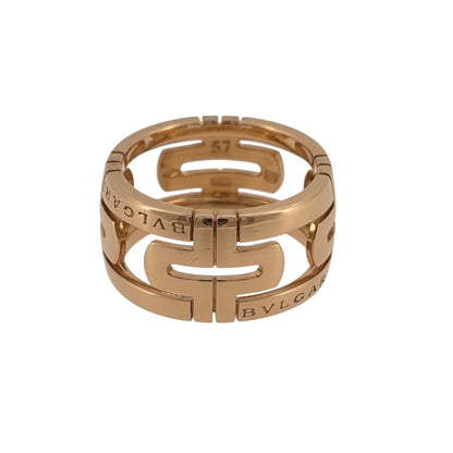 Add a bold gold statement piece to your jewellery collection with this pre-owned 18ct yellow gold BVLGARI-style band ring, featuring a wide open design with distinctive patterned detailing.

Design: The ring features a wide open band design with decorative patterning, creating a bold, contemporary appearance inspired by classic BVLGARI-style jewellery.
Material: Made from 18-carat yellow gold, the warm gold tone highlights the patterned detailing and gives the ring a substantial finish.