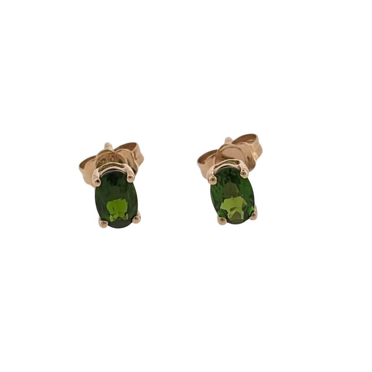 Add rich green colour to your jewellery collection with these pre-owned 9ct yellow gold chrome diopside stud earrings, featuring oval stones in a classic and easy-to-wear design.

Design: The earrings feature a classic oval stud design, allowing the chrome diopside stones to form the main focal point for a simple and elegant appearance.
Material: Made from 9-carat yellow gold, the warm gold tone complements the distinctive green colour of the chrome diopside stones.