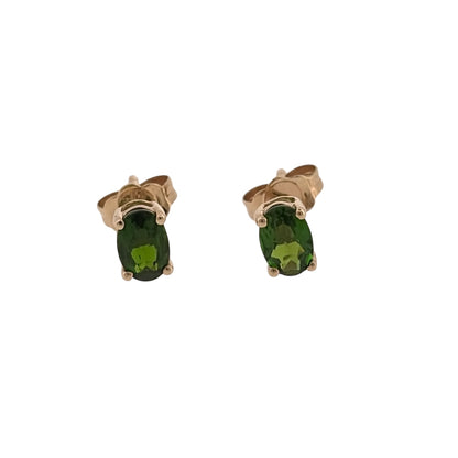 Add rich green colour to your jewellery collection with these pre-owned 9ct yellow gold chrome diopside stud earrings, featuring oval stones in a classic and easy-to-wear design.

Design: The earrings feature a classic oval stud design, allowing the chrome diopside stones to form the main focal point for a simple and elegant appearance.
Material: Made from 9-carat yellow gold, the warm gold tone complements the distinctive green colour of the chrome diopside stones.
