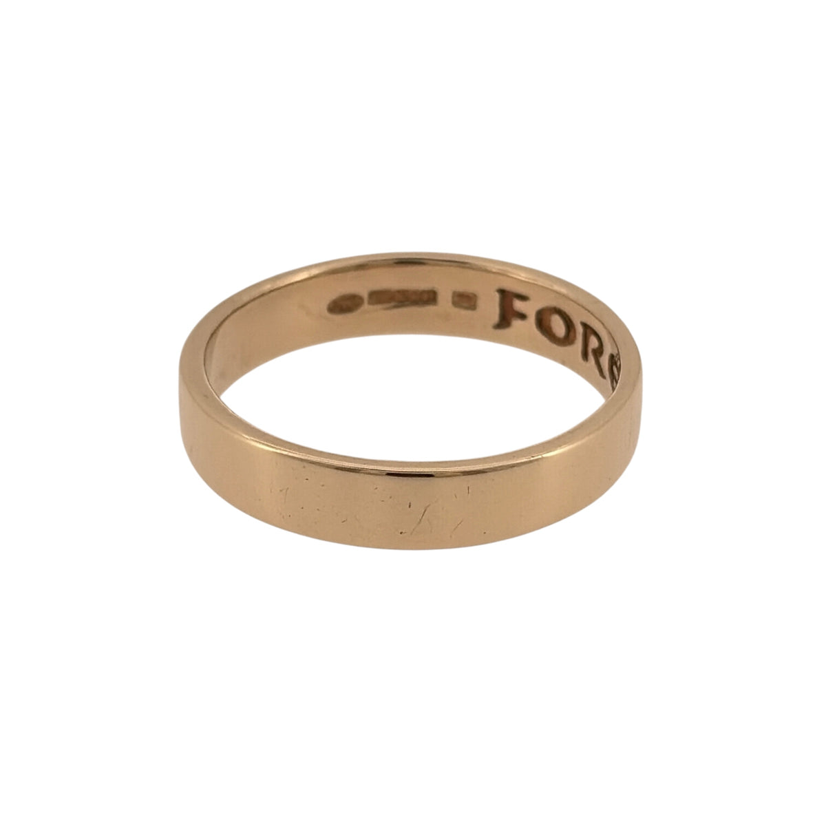 Celebrate a lasting commitment with this pre-owned 9ct yellow Cymru Welsh Gold wedding band, featuring a classic flat profile with a meaningful hidden detail inside.

Design: The ring features a simple flat wedding band design, offering a timeless and understated appearance suitable for everyday wear.
Material: Made from 9-carat yellow Cymru Welsh Gold, the warm gold tone gives the band a traditional and classic finish.