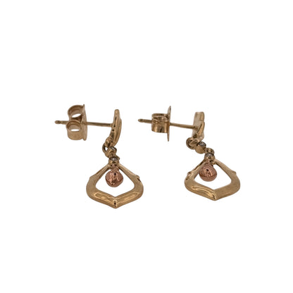 Add nature-inspired Welsh design to your jewellery collection with these pre-owned Clogau Acorn Leaf drop earrings, combining 9ct yellow and rose gold with elegant diamond detailing.

Design: The earrings feature a decorative acorn and leaf-inspired drop design, creating a distinctive nature-themed appearance with classic Clogau styling.
Material: Made from 9-carat yellow and rose gold, the contrasting gold tones highlight the leaf and acorn detailing and create an elegant two-tone finish.