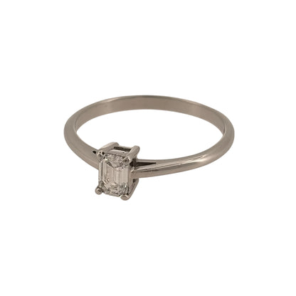 Add timeless elegance to your jewellery collection with this pre-owned platinum diamond solitaire ring, featuring an emerald-cut diamond of approximately 0.46ct.

Design: The ring features a classic solitaire design, with a single emerald-cut diamond forming the focal point for a clean and elegant appearance.
Material: Made from platinum, the naturally white metal provides a timeless setting that complements the diamond.