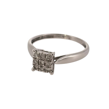 Add classic diamond detail to your jewellery collection with this pre-owned 9ct white gold diamond square cluster ring, featuring nine brilliant-cut diamonds arranged in a neat geometric setting.

Design: The ring features a square cluster design, with nine brilliant-cut diamonds arranged together in a three-by-three formation to create a defined geometric appearance.
Material: Made from 9-carat white gold, the bright white finish complements the diamond-set cluster.