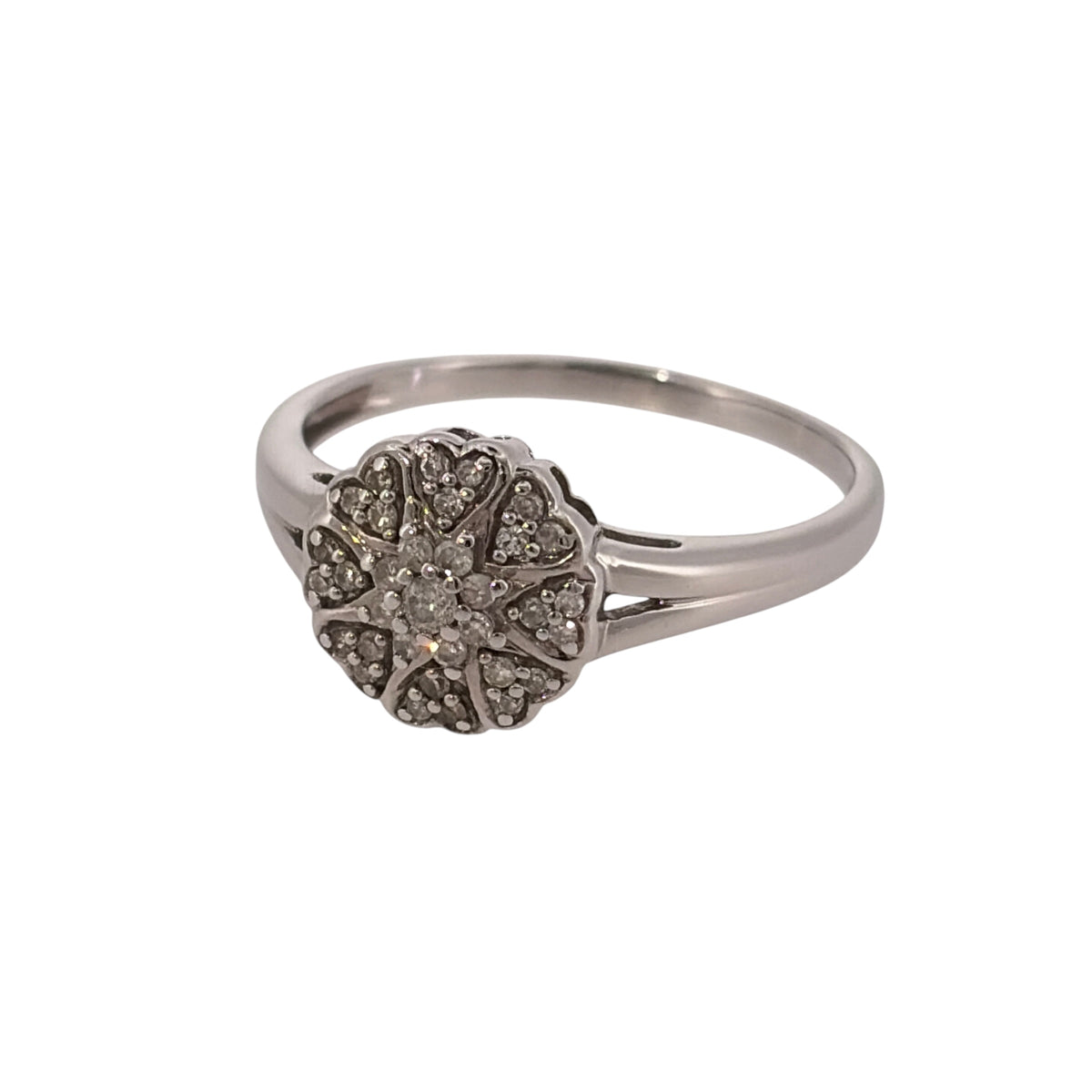 Add classic diamond detail to your jewellery collection with this pre-owned 9ct white gold diamond cluster ring, featuring a prominent round cluster design.

Design: The ring features a classic round cluster design, with multiple diamonds grouped together to create an eye-catching focal point on the finger.
Material: Made from 9-carat white gold, the bright white finish complements the diamond-set design.