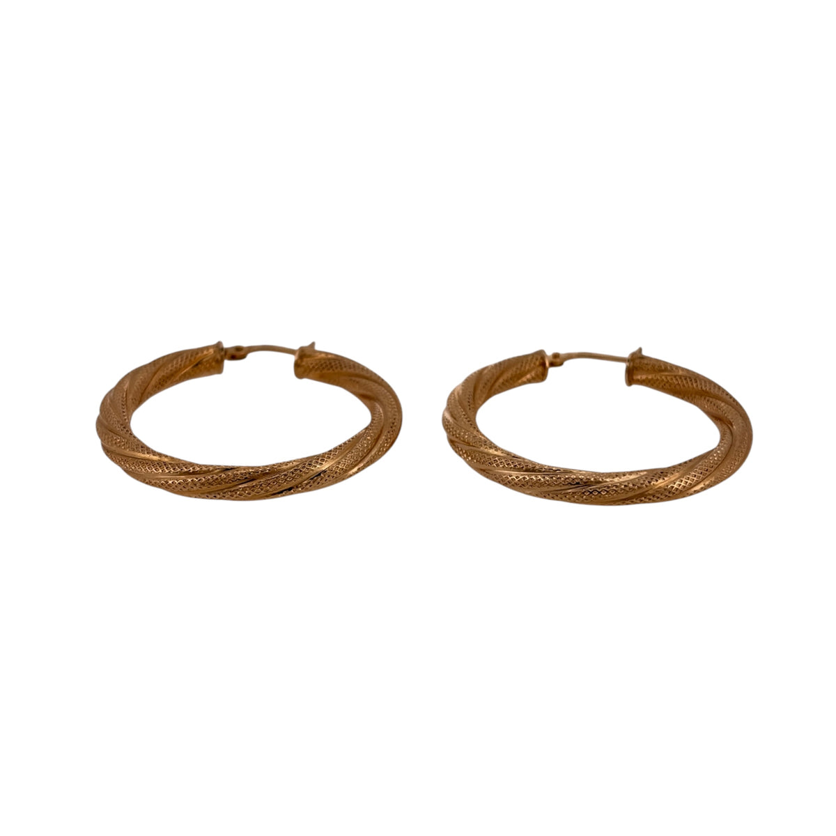 Add detailed gold style to your jewellery collection with these pre-owned 9ct yellow gold textured twisted hoop creole earrings.
Design: The earrings feature a classic round hoop shape with a twisted and textured finish, creating a more detailed alternative to plain creoles.
Material: Made from 9-carat yellow gold, the warm gold tone highlights the twisted shape and textured detailing.
Earring Detail: Each hoop creole measures approximately 34mm in diameter, creating a noticeable profile when worn.