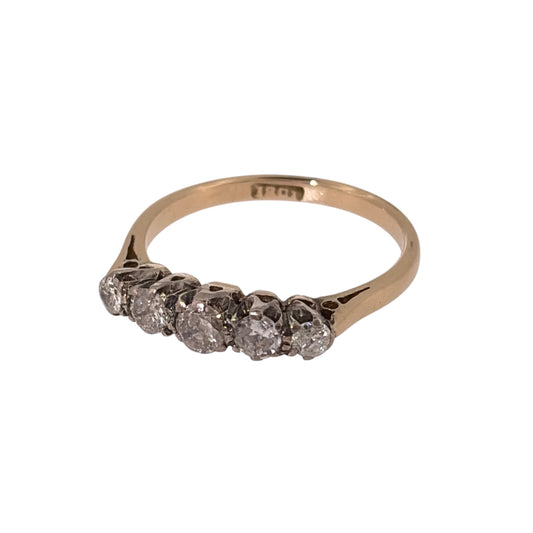Add classic diamond detail to your jewellery collection with this pre-owned 18ct yellow gold five-stone diamond band ring, featuring approximately 0.50ct of diamond content in total.

Design: The ring features a traditional five-stone band design, with five diamonds arranged across the front for a timeless and balanced appearance.
Material: Made from 18-carat yellow gold, the warm gold tone provides a classic setting for the row of diamonds.