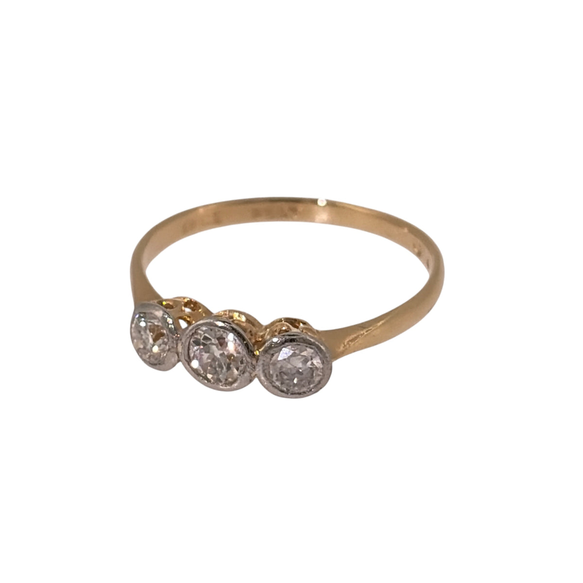 Add vintage diamond character to your jewellery collection with this pre-owned 18ct yellow gold and platinum trilogy ring, featuring approximately 0.43ct of old-cut diamonds.

Design: The ring features a traditional vintage trilogy design, with three old-cut diamonds arranged across the front for a classic period appearance.
Material: Made from 18-carat yellow gold and platinum, combining the warm tone of yellow gold with platinum around the diamond-set design.