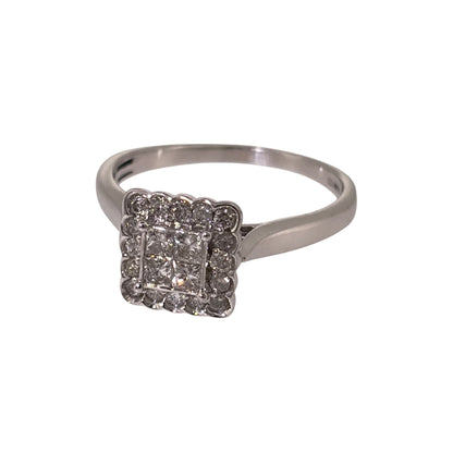 Add a distinctive diamond piece to your jewellery collection with this pre-owned 9ct white gold square cluster ring, featuring princess-cut and brilliant-cut diamonds with approximately 0.40ct of diamond content in total.
Design: The ring features a square cluster design, with four princess-cut diamonds set together at the centre and surrounded by brilliant-cut diamonds for a defined geometric appearance.