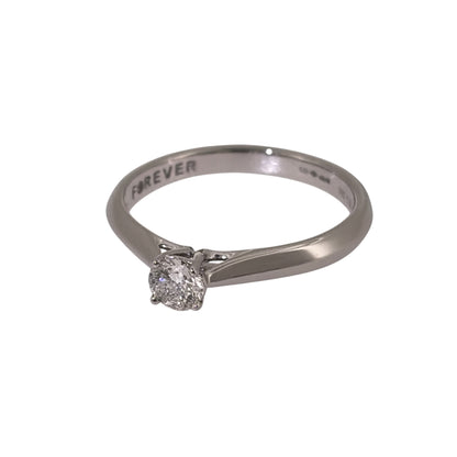 Add timeless diamond elegance to your jewellery collection with this pre-owned platinum solitaire ring, featuring a brilliant-cut diamond of approximately 0.28ct.

Design: The ring features a classic solitaire design, with a single brilliant-cut diamond forming the central focal point for a simple and timeless appearance.
Material: Made from platinum, the naturally white metal provides a classic setting that complements the diamond.
