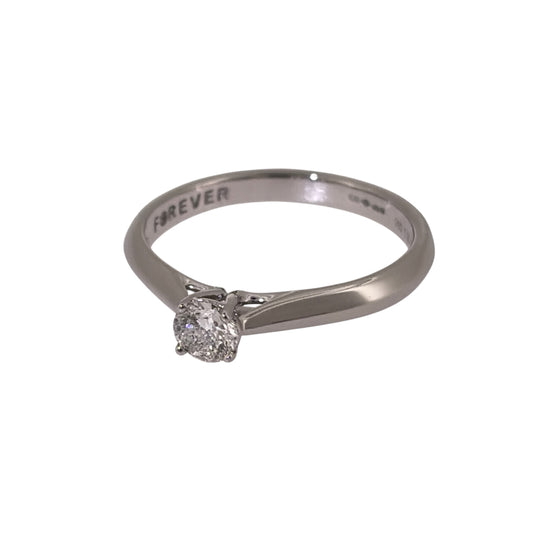 Add timeless diamond elegance to your jewellery collection with this pre-owned platinum solitaire ring, featuring a brilliant-cut diamond of approximately 0.28ct.

Design: The ring features a classic solitaire design, with a single brilliant-cut diamond forming the central focal point for a simple and timeless appearance.
Material: Made from platinum, the naturally white metal provides a classic setting that complements the diamond.