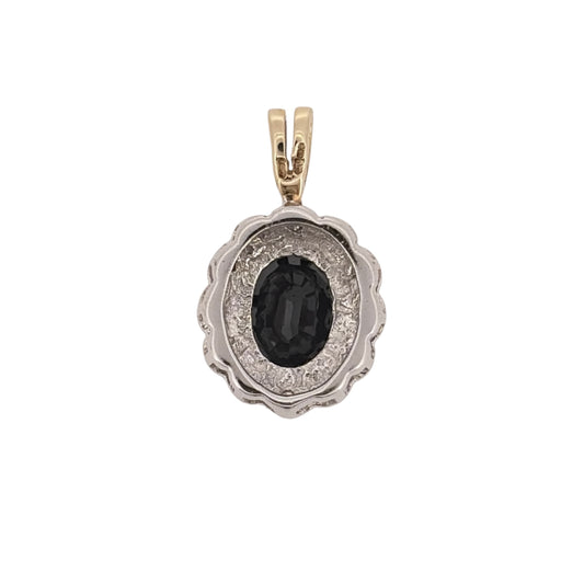Add classic gemstone colour to your jewellery collection with this pre-owned 9ct yellow and white gold diamond and sapphire cluster pendant, featuring an oval sapphire as its central focal point.

Design: The pendant features a traditional cluster design, with an oval sapphire at the centre complemented by diamond detailing and contrasting yellow and white gold.
Material: Made from 9-carat yellow and white gold, the two-tone finish complements the rich blue sapphire and diamond-set design.