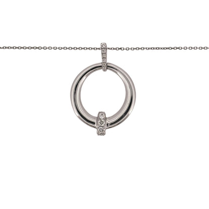 Add classic diamond detail to your jewellery collection with this pre-owned 9ct white gold round diamond pendant, presented on an adjustable trace chain.

Design: The necklace features a round pendant design with diamond detailing, creating a timeless and versatile appearance.
Material: Made from 9-carat white gold, the bright white finish complements the diamond-set design.
Diamond Detail: Diamonds are set within the round pendant, adding subtle detail to the design.