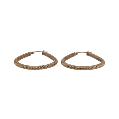 Add a distinctive gold design to your jewellery collection with these pre-owned 9ct yellow gold textured handbag-style creole earrings.

Design: The earrings feature an unusual handbag-style creole shape with textured detailing, creating a bold alternative to traditional hoop designs.
Material: Made from 9-carat yellow gold, the warm gold tone highlights the textured finish and distinctive shape.