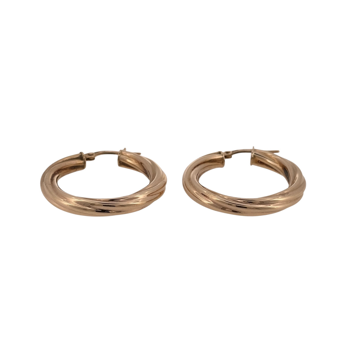 Add classic gold detail to your jewellery collection with these pre-owned 9ct yellow gold twisted hoop creole earrings.

Design: The earrings feature a classic round hoop shape with a twisted design, adding extra detail and texture to the traditional creole style.
Material: Made from 9-carat yellow gold, the warm gold tone complements the twisted detailing and gives the earrings a timeless finish.