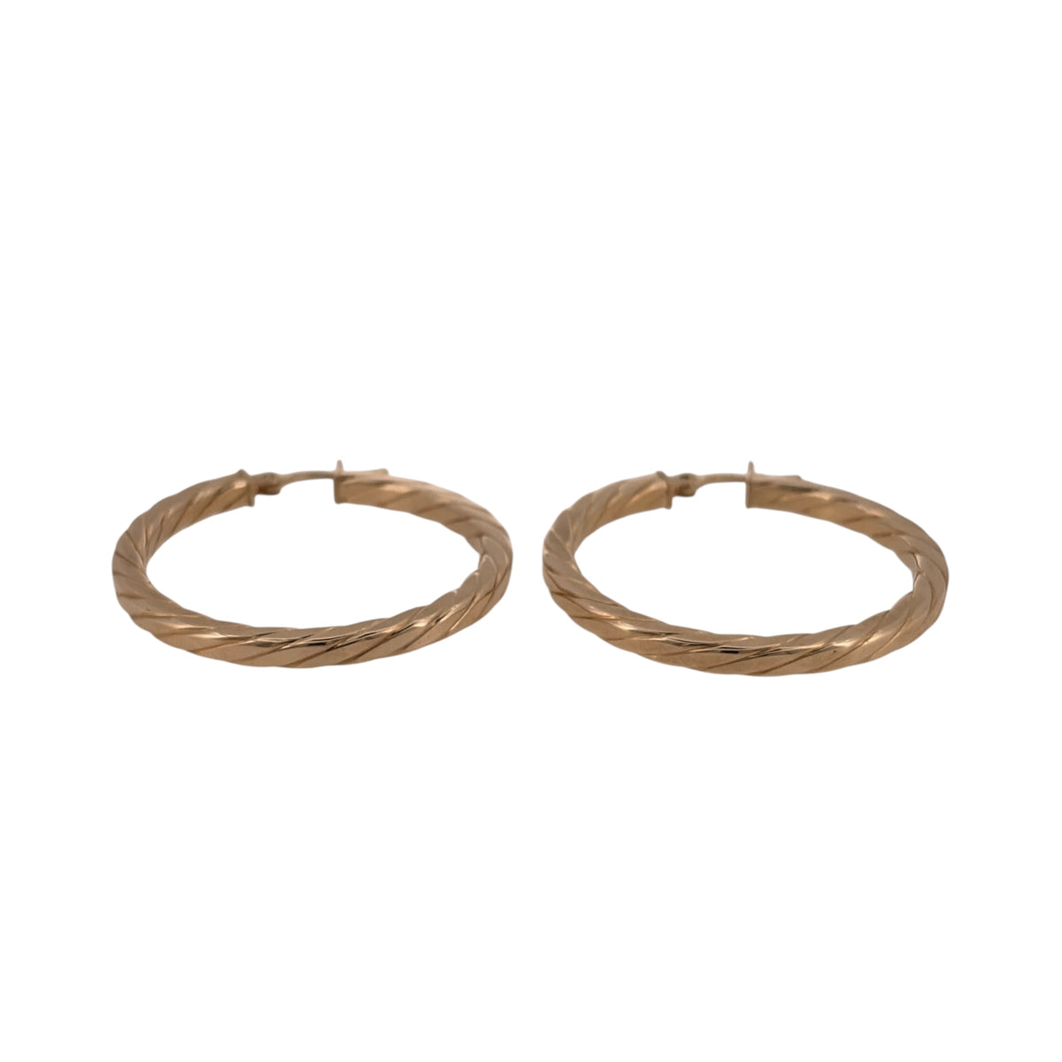 Add a bold gold design to your jewellery collection with these pre-owned 9ct yellow gold squared twisted hoop creole earrings.

Design: The earrings feature a large hoop creole shape with a squared, twisted design, creating a distinctive alternative to traditional rounded hoops.
Material: Made from 9-carat yellow gold, the warm gold tone highlights the twisted detailing and defined squared profile.