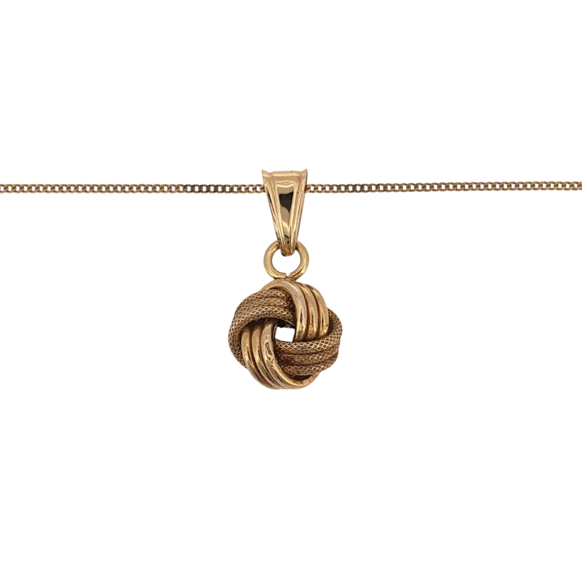 Add classic gold detail to your jewellery collection with this pre-owned 9ct yellow gold textured knot pendant, presented on a fine 18-inch curb chain.

Design: The necklace features a decorative knot-style pendant with a textured finish, creating a detailed yet versatile appearance.
Material: Made from 9-carat yellow gold, the warm gold tone highlights the textured detailing of the knot design.
Pendant Detail: The knot pendant measures approximately 1.9cm long including the bail by 9mm wide.