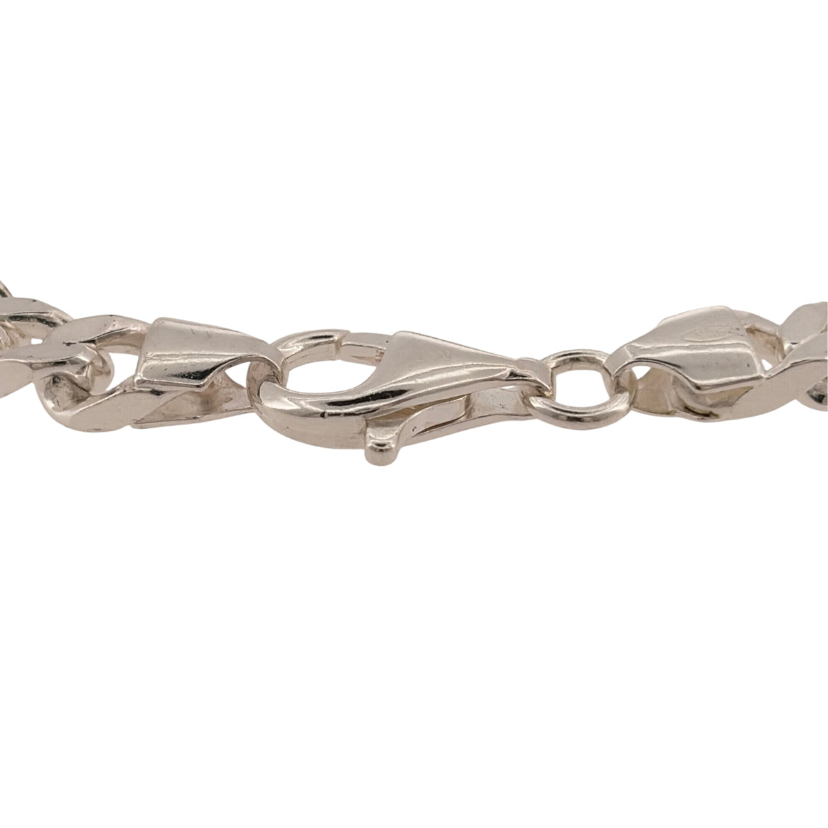 Add a substantial silver piece to your jewellery collection with this pre-owned 925 sterling silver curb bracelet, featuring a classic 6mm link width.

Design: The bracelet features a traditional curb link design, creating a bold and timeless appearance suitable for wearing alone or paired with other jewellery.
Material: Made from 925 sterling silver, the bright silver finish complements the classic curb link design.