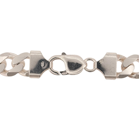 Add a substantial silver statement piece to your jewellery collection with this pre-owned 925 sterling silver curb chain, featuring a bold 11mm link width and longer 22-inch length.

Design: The chain features a traditional curb link design, with wide interlocking links creating a bold and timeless appearance suitable for wearing alone.
Material: Made from 925 sterling silver, the bright silver finish complements the classic curb link design.