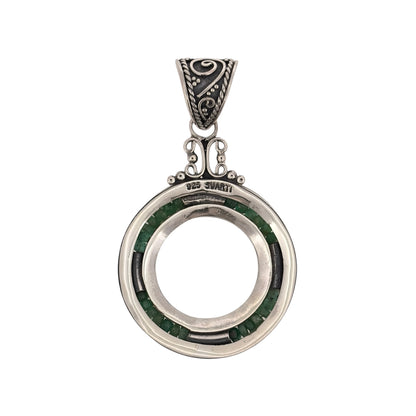 Add a distinctive piece to your jewellery collection with this pre-owned 925 sterling silver and green stone round pendant, featuring a decorative patterned design.

Design: The pendant features a round shape with fancy patterned detailing, complemented by a green stone that adds a lovely touch of colour.
Material: Made from 925 sterling silver.
Gemstone Detail: Features a green stone that provides a colourful contrast against the silver design.