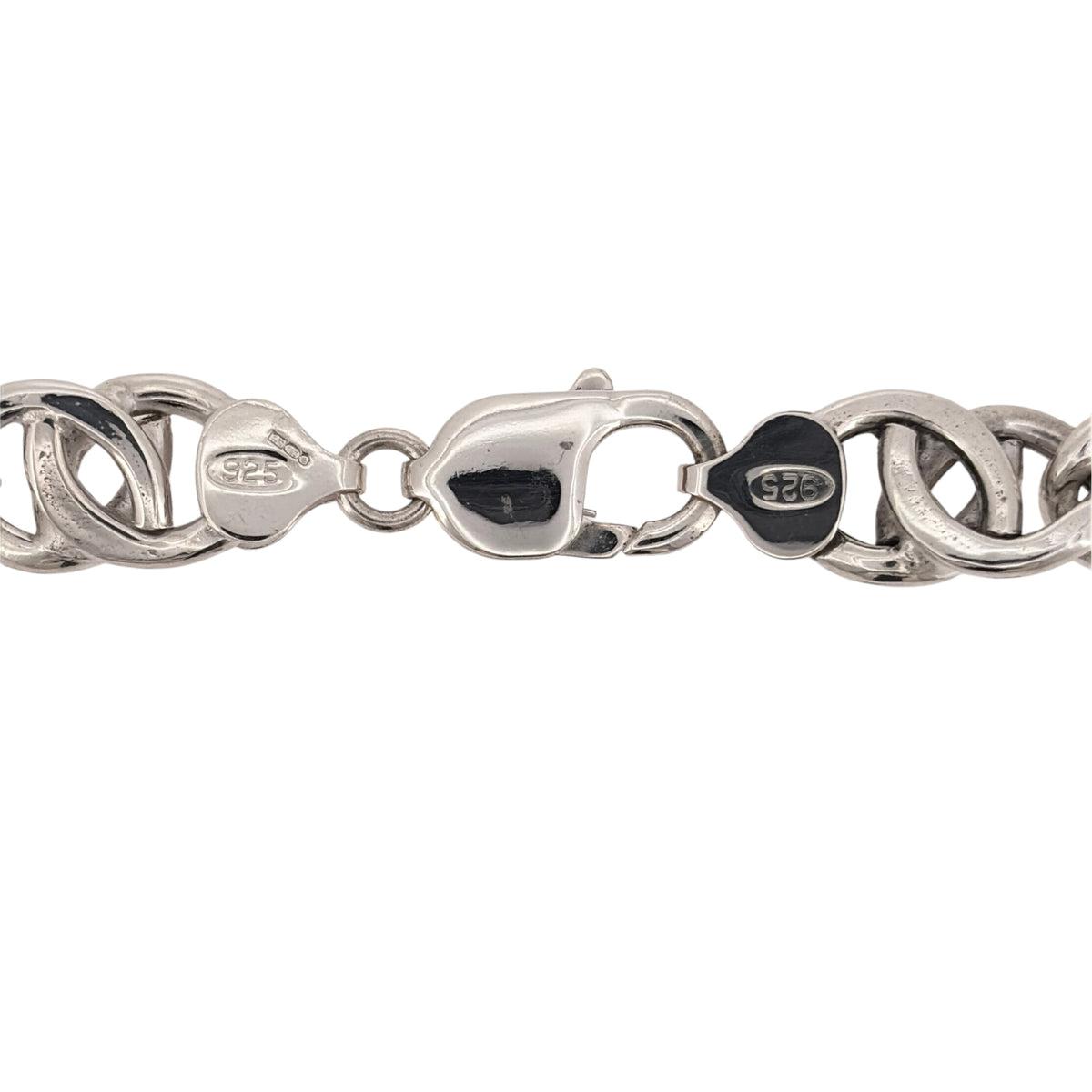Add a bold silver piece to your jewellery collection with this pre-owned 925 sterling silver double link curb chain, featuring a substantial 11mm link width and a distinctive design.

Design: The chain features a double link curb design, with interlocking links creating a bold and textured appearance suitable for wearing alone as a statement piece.
Material: Made from 925 sterling silver, complementing the classic curb link design.