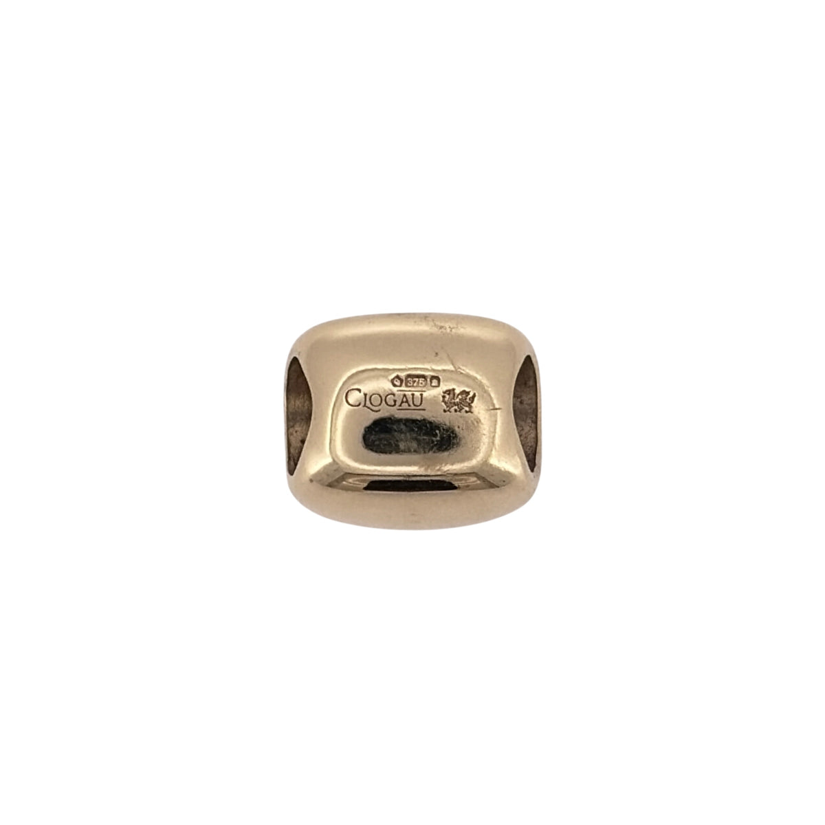 Add a traditional Welsh piece to your jewellery collection with this pre-owned 9ct yellow and rose gold Clogau Welsh Dragon bead charm, featuring the iconic Welsh Dragon design.

Design: The charm features a decorative Welsh Dragon design, combining yellow and rose gold to create a distinctive piece inspired by Welsh heritage.
Material: Made from 9ct yellow and rose gold.
Charm Detail: The bead charm features the Welsh Dragon emblem, making it a meaningful addition to a suitable charm bracelet.