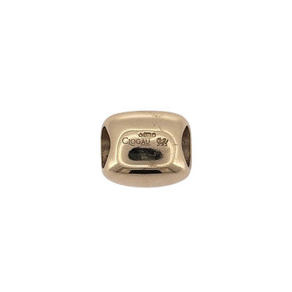 Add a traditional Welsh piece to your jewellery collection with this pre-owned 9ct yellow and rose gold Clogau Welsh Dragon bead charm, featuring the iconic Welsh Dragon design.

Design: The charm features a decorative Welsh Dragon design, combining yellow and rose gold to create a distinctive piece inspired by Welsh heritage.
Material: Made from 9ct yellow and rose gold.
Charm Detail: The bead charm features the Welsh Dragon emblem, making it a meaningful addition to a suitable charm bracelet.