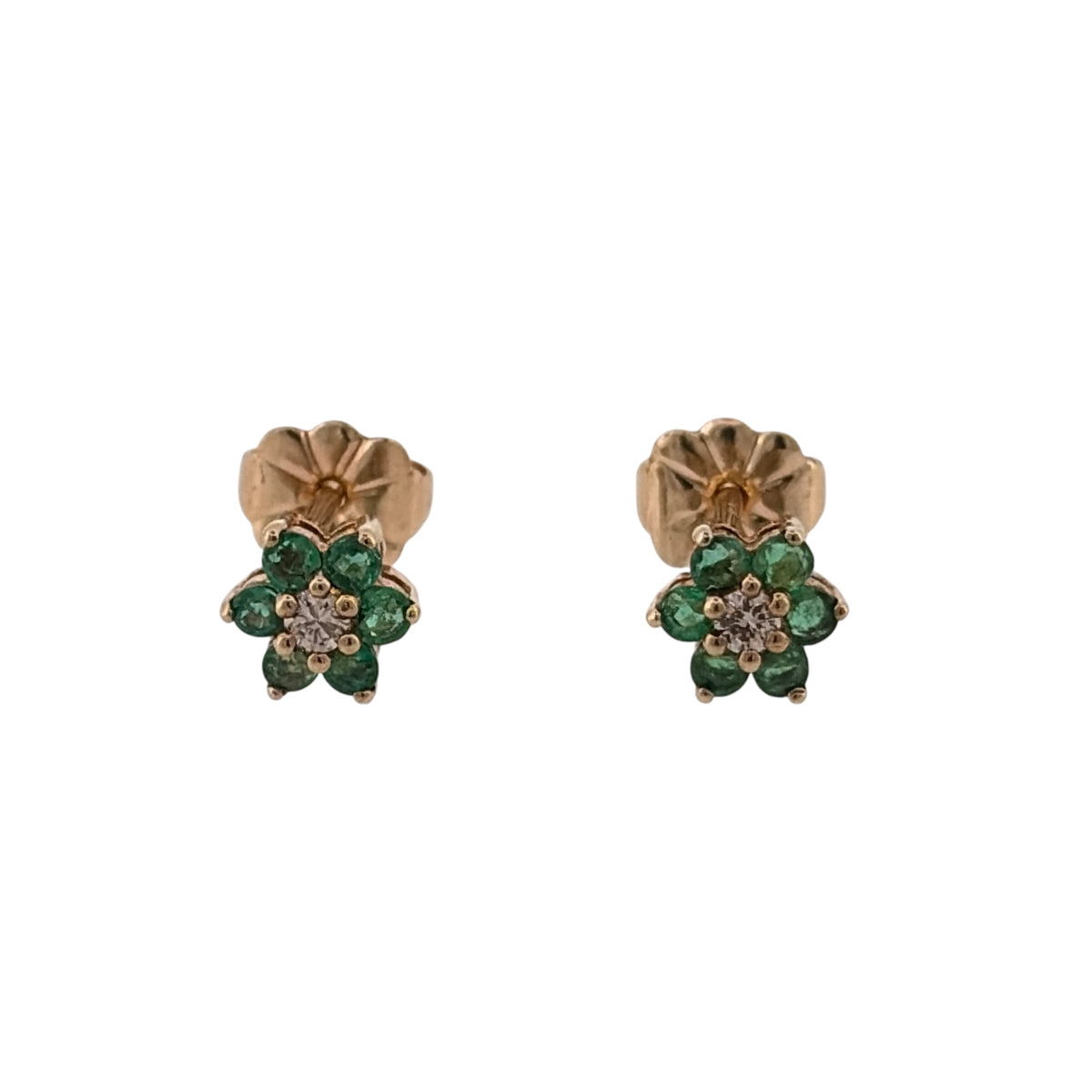 Add a colourful piece to your jewellery collection with these pre-owned 9ct yellow gold diamond and emerald cluster stud earrings, featuring a central diamond surrounded by beautiful green emeralds.

Design: The earrings feature a classic round cluster design, with a diamond at the centre surrounded by emeralds, creating an elegant and timeless appearance.
Material: Made from 9ct yellow gold, offering a warm gold finish that complements the diamonds and emeralds.