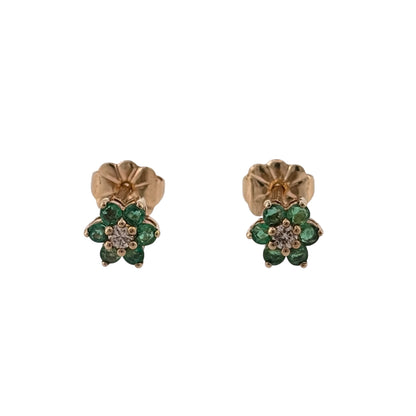 Add a colourful piece to your jewellery collection with these pre-owned 9ct yellow gold diamond and emerald cluster stud earrings, featuring a central diamond surrounded by beautiful green emeralds.

Design: The earrings feature a classic round cluster design, with a diamond at the centre surrounded by emeralds, creating an elegant and timeless appearance.
Material: Made from 9ct yellow gold, offering a warm gold finish that complements the diamonds and emeralds.