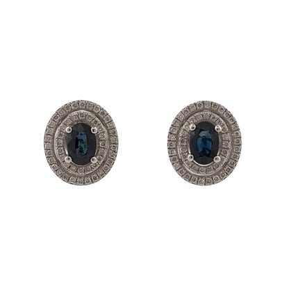 Add an elegant piece to your jewellery collection with these pre-owned 18ct white gold diamond and sapphire double halo stud earrings, featuring beautiful oval sapphires surrounded by two rows of diamonds.

Design: The earrings feature a classic double halo design, with a central oval sapphire surrounded by two halos of diamonds, creating a decorative and timeless appearance.
Material: Made from 18ct white gold, offering a bright white finish that complements the sapphires and diamonds.