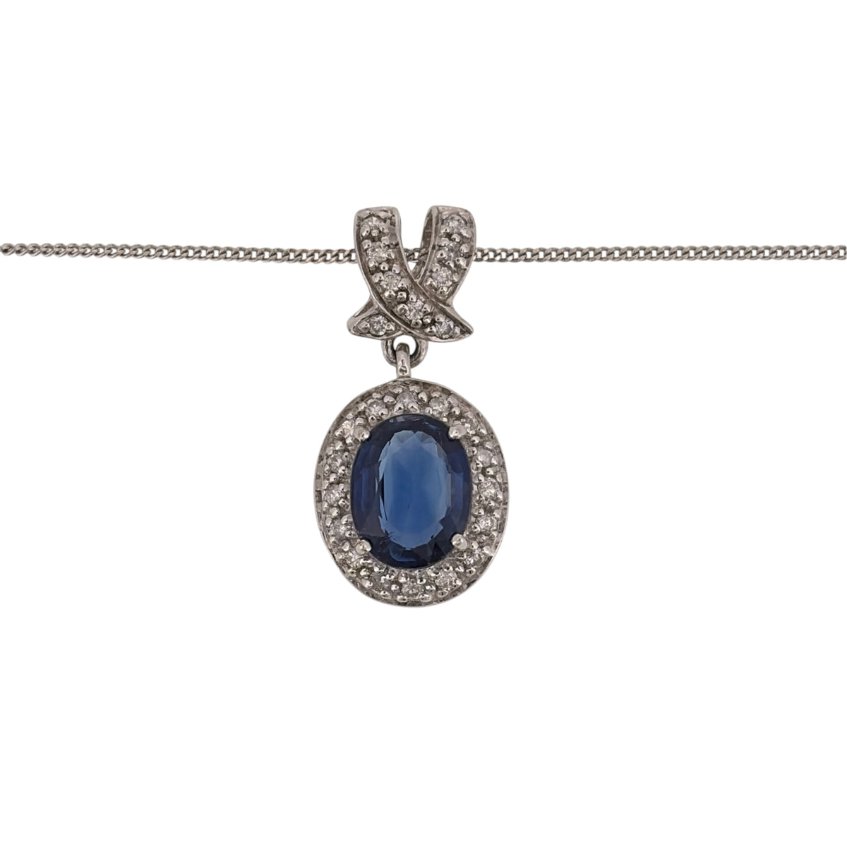 Add an elegant piece to your jewellery collection with this pre-owned 9ct white gold diamond and sapphire pendant necklace, featuring a beautiful oval sapphire complemented by diamond detailing.

Design: The necklace features a decorative diamond and sapphire pendant, with a central oval sapphire creating a classic and timeless appearance.
Material: Made from 9ct white gold, offering a bright white finish that complements the sapphire and diamonds.