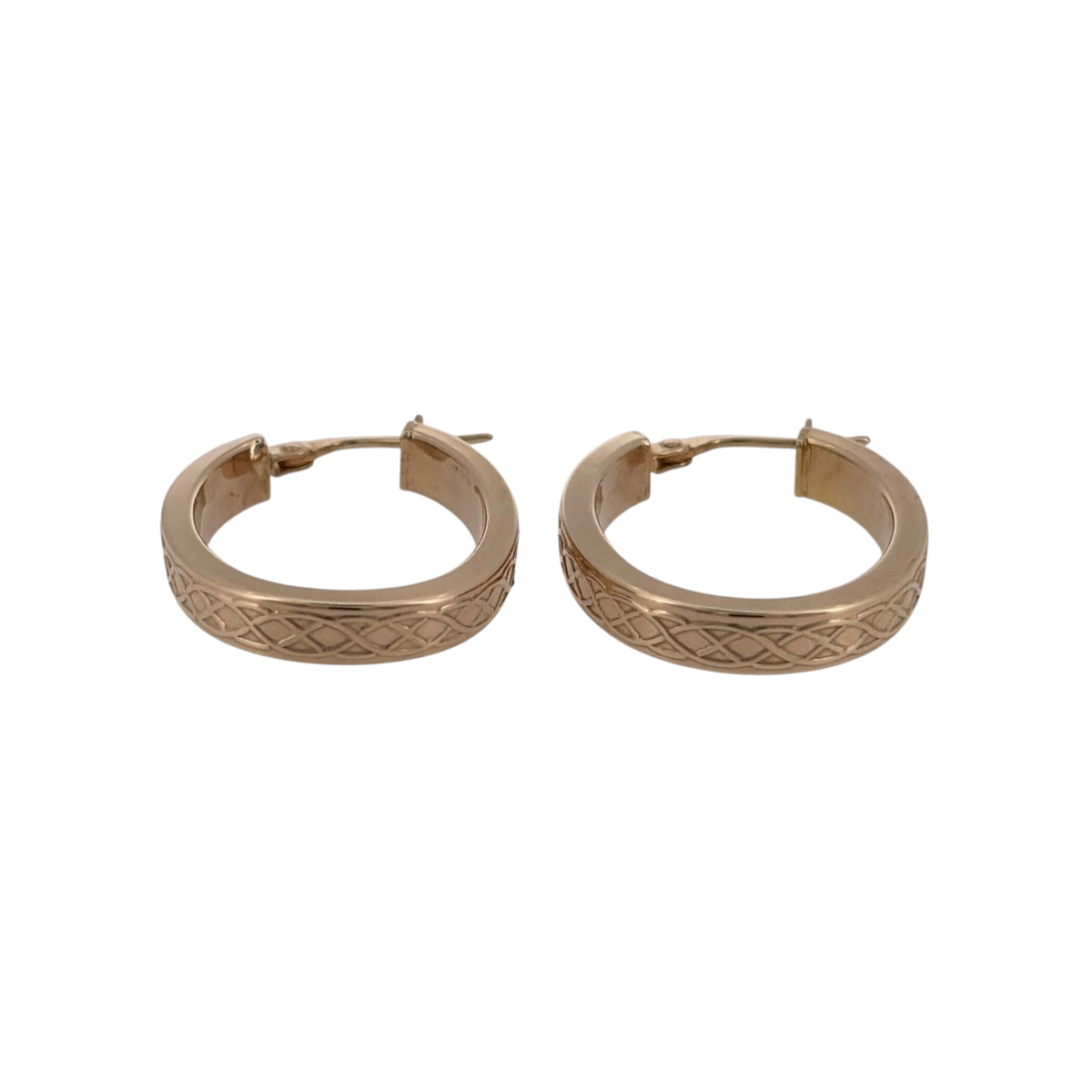 Add a traditional piece to your jewellery collection with these pre-owned 9ct yellow gold Celtic weave oval creole earrings, featuring an intricate woven design inspired by Celtic patterns.

Design: The earrings feature an oval creole shape with decorative Celtic weave detailing, creating a distinctive and timeless appearance.
Material: Made from 9ct yellow gold, offering a warm gold finish that complements the traditional Celtic design.