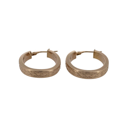 Add a traditional piece to your jewellery collection with these pre-owned 9ct yellow gold Celtic weave oval creole earrings, featuring an intricate woven design inspired by Celtic patterns.

Design: The earrings feature an oval creole shape with decorative Celtic weave detailing, creating a distinctive and timeless appearance.
Material: Made from 9ct yellow gold, offering a warm gold finish that complements the traditional Celtic design.