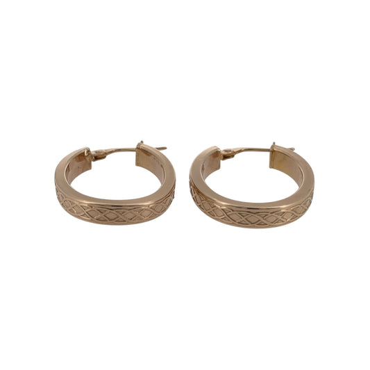 Add a traditional piece to your jewellery collection with these pre-owned 9ct yellow gold Celtic weave oval creole earrings, featuring an intricate woven design inspired by Celtic patterns.

Design: The earrings feature an oval creole shape with decorative Celtic weave detailing, creating a distinctive and timeless appearance.
Material: Made from 9ct yellow gold, offering a warm gold finish that complements the traditional Celtic design.