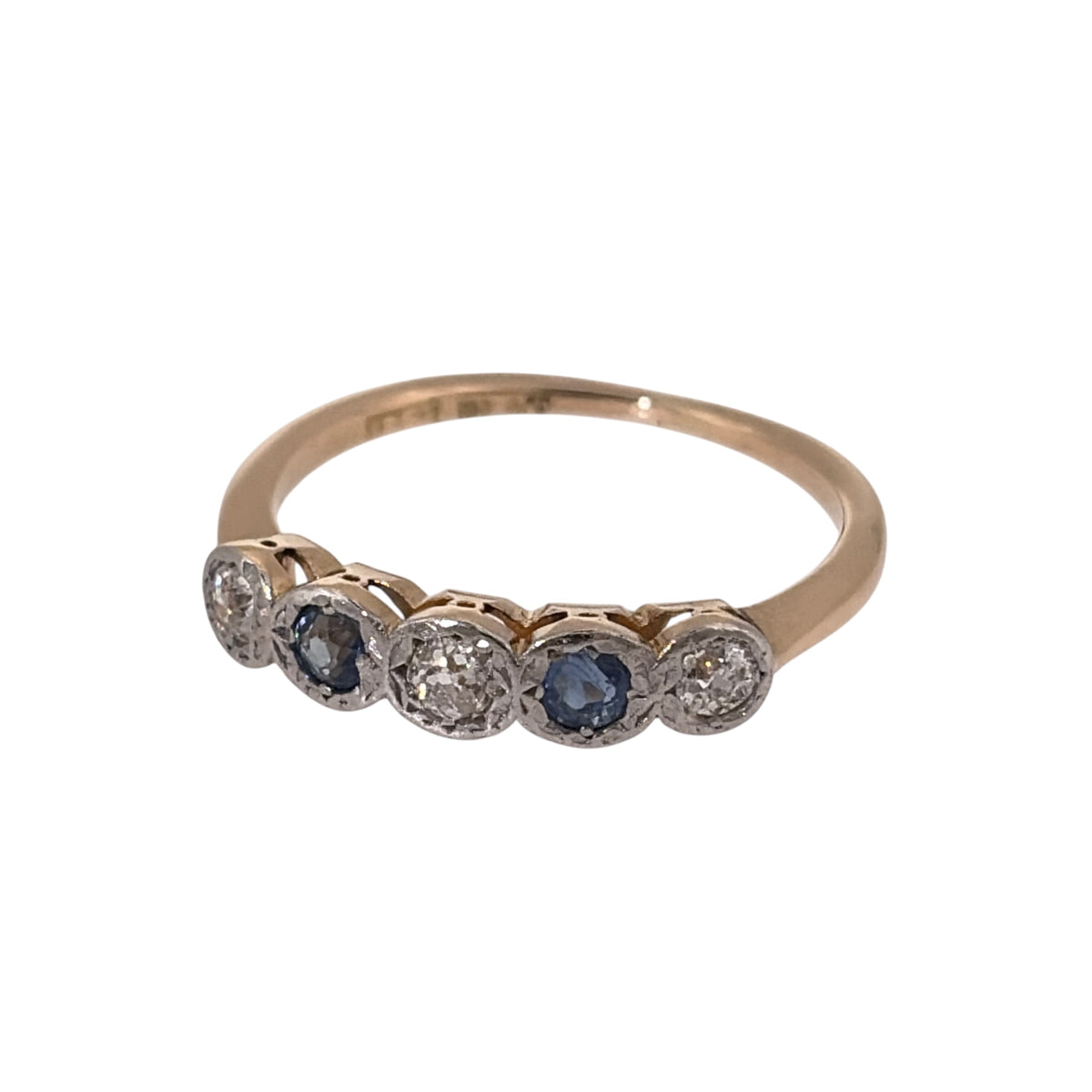 Add a classic piece to your jewellery collection with this pre-owned 18ct yellow gold and platinum diamond and sapphire band ring, featuring a beautiful combination of gemstones and two-tone precious metals.

Design: The ring features a traditional band design with diamond and sapphire detailing, creating an elegant and timeless appearance suitable for everyday wear or special occasions.