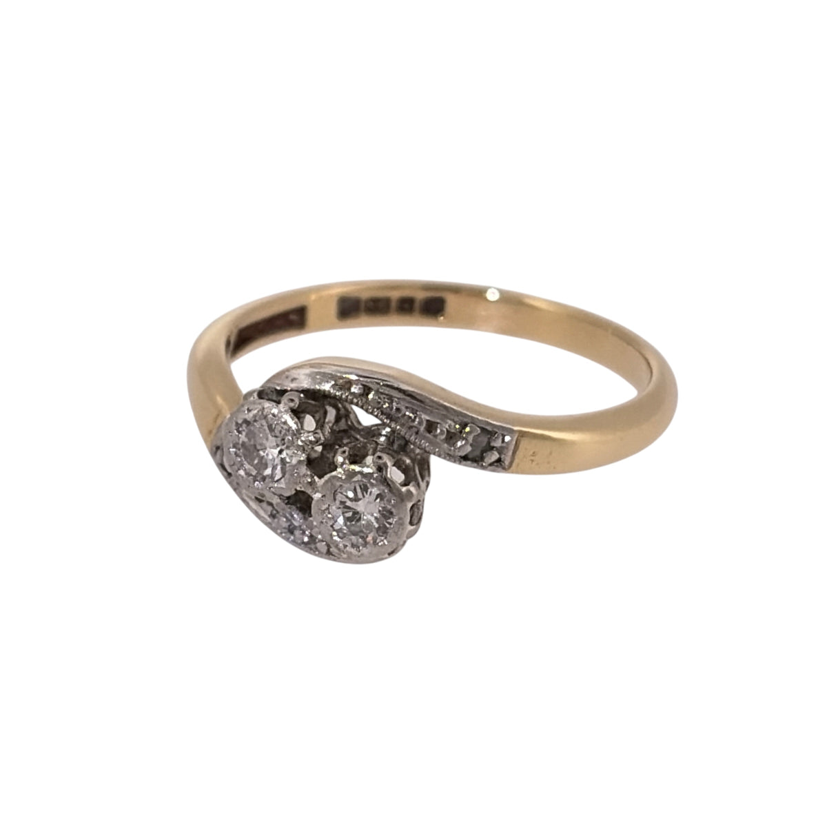 Add an elegant piece to your jewellery collection with this pre-owned 18ct yellow gold and diamond double twist ring, featuring a flowing design with approximately 0.20ct of diamonds.

Design: The ring features a decorative double twist design, with intertwining curves creating a distinctive and elegant appearance.
Material: Made from 18ct yellow gold, offering a warm gold finish that complements the diamonds.