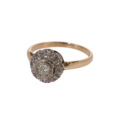 Add a classic piece to your jewellery collection with this pre-owned 18ct yellow gold and diamond cluster ring, featuring a decorative diamond-set front with approximately 0.15ct of diamonds.

Design: The ring features a traditional cluster design, with multiple diamonds arranged together to create an elegant and timeless appearance.
Material: Made from 18ct yellow gold, offering a warm gold finish that complements the diamonds.