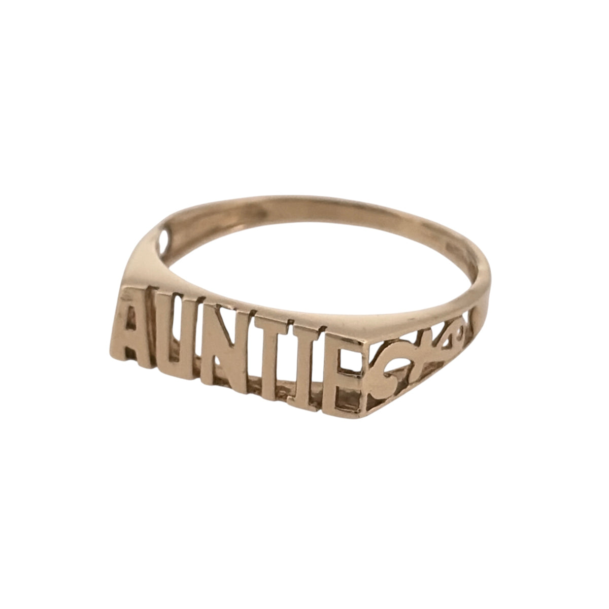 Add a meaningful piece to your jewellery collection with this pre-owned 9ct yellow gold Auntie ring, featuring a decorative design celebrating someone special.

Design: The ring features the word 'Auntie' across the front, creating a sentimental and timeless piece of jewellery.
Material: Made from 9ct yellow gold, offering a warm gold finish that complements the design.
Ring Detail: The front of the ring measures approximately 5mm wide, creating a delicate and decorative appearance on the finger.